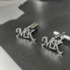 Cross-border personalized custom K gold stainless steel cut letter hollow cufflinks European and American high-end fashion gift accessories